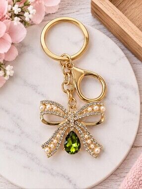 Gold Bow Keychain Pendant with Green Gem and Pearls